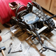 This bearing, pressed on, prevents the side plate of the frame from coming off, so out came the puller.